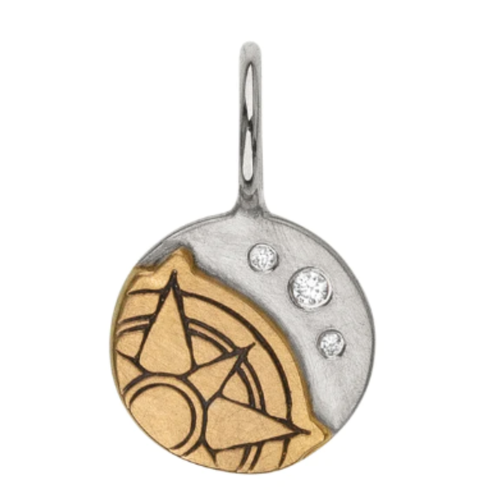 HEATHER B. MOORE SILVER AND GOLD CHARM WITH PARTIAL RAISED COMPASS ROSE